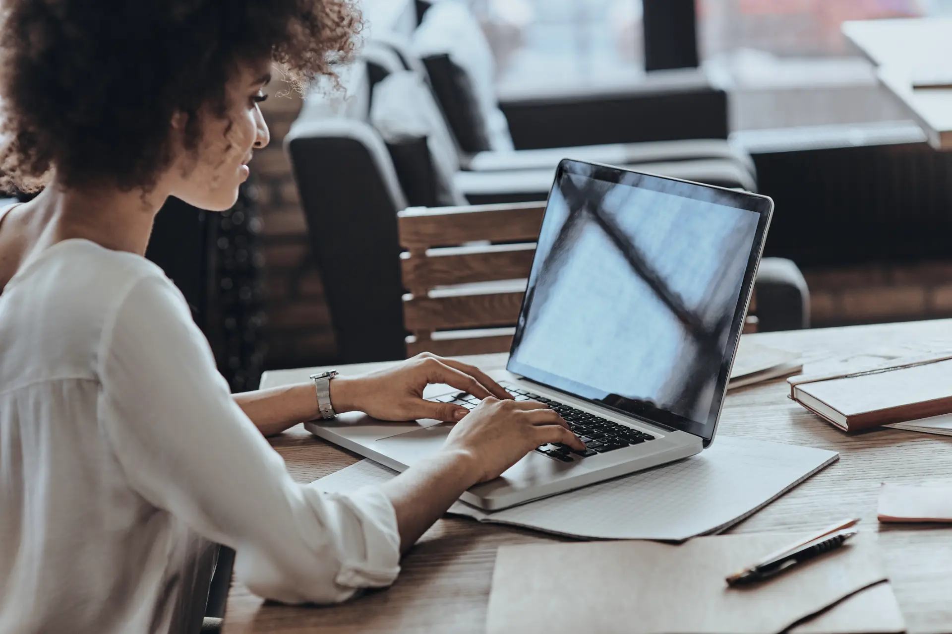 achieving-best-results-rear-view-african-woman-using-computer